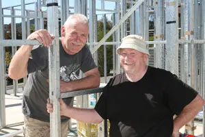 Alan with builder Steve with wall frame